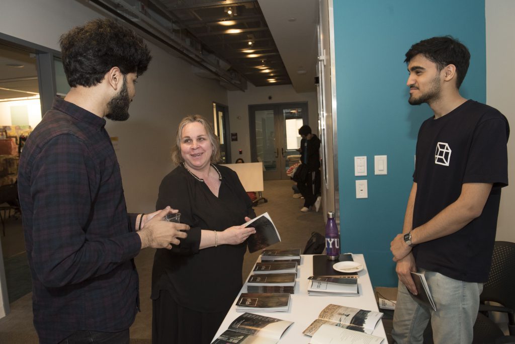 Student discussing their work at IDM showcase 2018