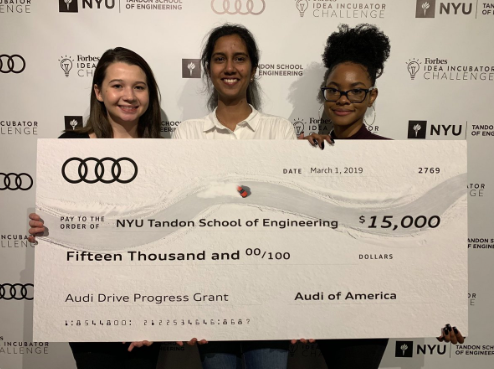 From Left to Right, Jillian Larson, Nicola Ramdass, and Bryanna Simone Allen Holding a $15,000 dollar check from Audi of America